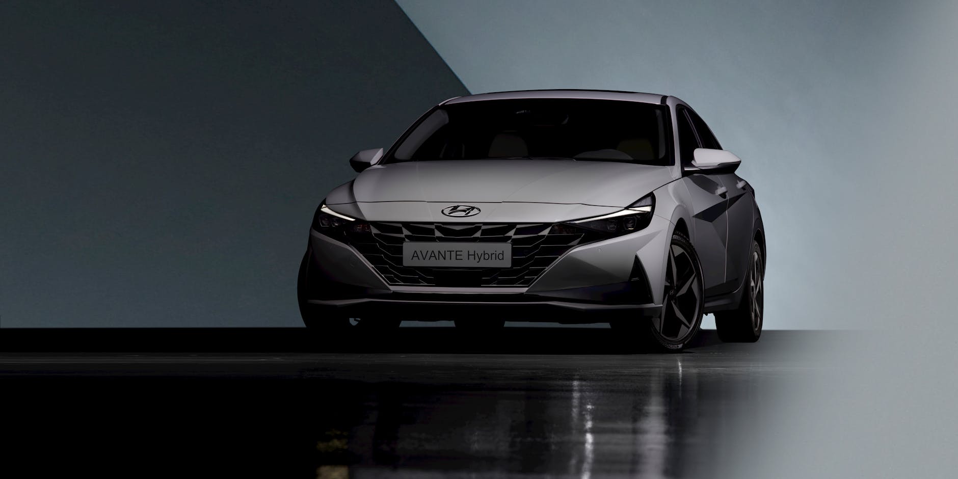 Nowoczesny srebrny sedan hybrydowy w studiu jako ilustracja artykułu o Lexusie